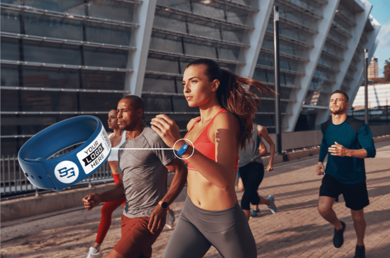 runner wearing Sports Guardian wristband